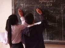 Children in Laos at the Blackboard