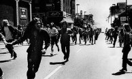 sixties protesters running