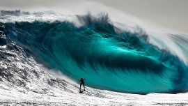 large wave with surfer
