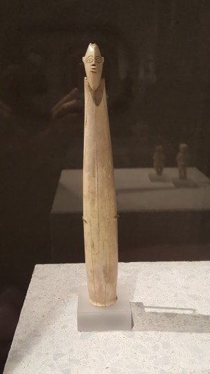 prehistoric bearded figure